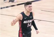  ?? USA TODAY SPORTS ?? Heat guard Tyler Herro celebrates after a lay-up against the Celtics during the second half.