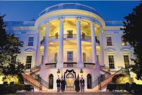  ?? EVAN VUCCI/ASSOCIATED PRESS ?? From left, President Joe Biden, first lady Jill Biden, Vice President Kamala Harris and her husband Doug Emhoff, stand outside the White House Monday during a ceremony to honor the 500,000 Americans who have died from COVID-19.