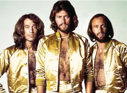  ??  ?? Proud: Barry Gibb with late brothers Robin and Maurice. They sold more than 200million records