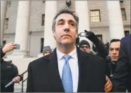  ?? Julie Jacobson / Associated Press ?? Michael Cohen walks out of federal court, Thursday in New York, after pleading guilty to lying to Congress about work he did on an aborted project to build a Trump Tower in Russia.