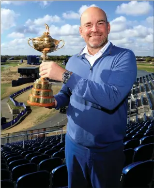  ??  ?? Thomas Bjorn clutches the Ryder Cup, declaring Europe’s victory ‘amazing’