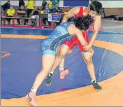 ??  ?? Sonam Malik (red) in action against Sakshi Malik.