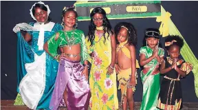  ??  ?? Students at Beecham Hill Primary and Infant School in Flint River, St Mary, explore the issue of national identity by performing as British, Indian, Chinese, Taino, and African models during a fashion show to celebrate Jamaica Day last week.