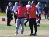  ?? ANDA CHU — BAY AREA NEWS GROUP, 2020 ?? San Francisco 49ers head coach Kyle Shanahan, left, and general manager John Lynch look on during the team’s practice at Levi’s Stadium on Jan. 24.