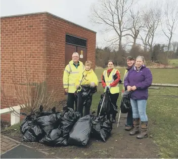  ??  ?? Members of the Tidy Fatfield Group with some of the bags of litter they have collected around the village.