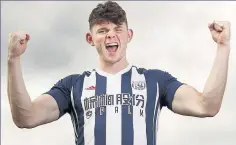  ??  ?? MUSCLE MAN Baggies new boy Burke shows off his guns