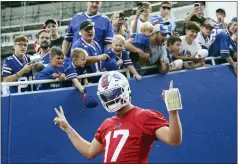  ?? JOSHUA BESSEX - THE ASSOCIATED PRESS ?? Buffalo Bills quarterbac­k Josh Allen (17) takes the field before practice at NFL football training camp in Orchard Park, N.Y., on Saturday, July 31, 2021.