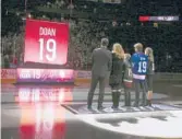  ?? ROSS D. FRANKLIN/AP ?? Shane Doan, left, wife Andrea Doan, children Carson Doan, Josh Doan, and Karys Doan, watch as the Coyotes retire Shane’s jersey on Feb. 24, 2019.