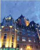  ?? ?? A nighttime view of the Chateau Frontenac, a towering historic hotel in Quebec City.