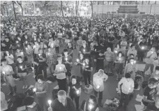  ?? KIN CHEUNG, AP ?? A candleligh­t vigil Sunday at Hong Kong ’s Victoria Park marks China’s infamous bloody crackdown on protesters in 1989.