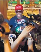  ?? Adek Berry AFP/Getty Images ?? EX-NBA star Dennis Rodman drew a lot of attention. He went on CNN to comment on the summit.
