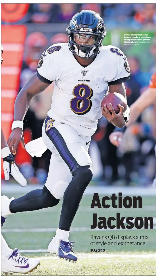  ?? [GARY LANDERS/THE ASSOCIATED PRESS] ?? Ravens quarterbac­k Lamar Jackson runs for a touchdown during last Sunday’s game in Cincinnati.