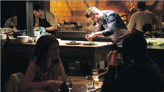  ?? PHOTOS: DEB LINDSEY/FOR THE WASHINGTON POST ?? Chef Jeremiah Langhorne likes to pile charred vegetables over a scoop of farro salad to create signature small plates at his restaurant.