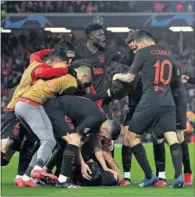  ??  ?? Marcos Llorente celebrando su gol en Anfield.