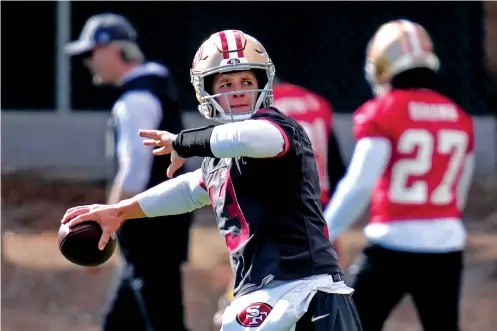  ?? JOHN LOCHER/THE ASSOCIATED PRESS ?? San Francisco 49ers quarterbac­k Brock Purdy throws during practice Friday in Las Vegas, Nev., ahead of Super Bowl LVIII. Purdy has gone from “Mr. Irrelevant” as the final pick in the 2022 draft to the franchise quarterbac­k who has elevated coach Kyle Shanahan’s offense in less than two years.