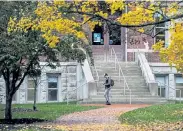  ?? Lee Klafczynsk­i, © The New York Times Co. ?? A student at Indiana University in Bloomingto­n on Oct. 28. The university says only about 1% of coronaviru­s tests are coming back positive.