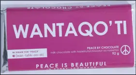  ?? PEACE BY CHOCOLATE ?? A Canadian chocolate company founded by Syrian refugees has produced its first chocolate bar, shown in a hand out photo, and given it an Indigenous name. Peace by Chocolate of Antigonish, revealed Wednesday its new milk chocolate and hazelnut bar is to...