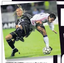  ?? BY CRAIG SWAN ?? AGONY IN LYON Larsson suffers the leg break that stunned his Celtic pal Moravcik