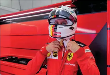  ?? Bottom right, ?? Ferrari’s Sebastian Vettel during practice, as F1 resumes following the outbreak of the coronaviru­s disease.
Mattia Binotto.