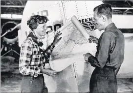  ?? AP ?? Aviator Amelia Earhart and navigator Fred Noonan took off from New Guinea on July 2, 1937, en route to Howland Island in the central Pacific Ocean. But something went wrong, and they vanished.