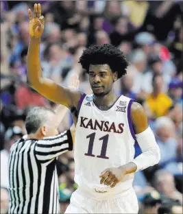  ?? TONY GUTIERREZ/ THE ASSOCIATED PRESS ?? Kansas guard Josh Jackson celebrates sinking a 3-pointer against Michigan State during the Jayhawks’ second-round NCAA Tournament victory Sunday in Tulsa, Okla.