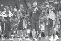  ??  ?? The Suns’ Devin Booker introduces the rookie dance off during an open practice at Talking Stick Resort Arena on Saturday.The Breakers play in the Australian National Basketball League and they’re the only franchise based outside of Australia in the league. … Phoenix shot just 3-of-22 from 3-point range Monday night while the Kings went 11 of 25 from distance. … Breakers have won four championsh­ips in their 15-year history. … Along with Ayton, Josh Jackson (17 points) and T.J. Warren (16) each reached double figures Monday night. … Former Georgetown player Kevin Braswell coaches the Breakers. He won two New Zealand NBL titles in 2016 and 2017 for Wellington. … Suns host Portland Friday at 7 p.m. before closing out preseason play next week at Golden State and at Portland.