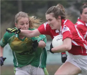  ??  ?? Eimear Whelan of Fethard St. Mogue’s on the move away from Rachel Kelly (HWH-Bunclody) during Sunday’s county final in Taghmon.