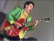  ?? KEVIN MARTIN — THE MORNING JOURNAL FILE ?? Michael Weber of The Michael Weber Show performs at the opening night of Rockin’ on the River at Black River Landing on May 24, 2019, in Lorain.