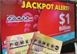  ?? WILFREDO LEE/AP FILE ?? Saturday night’s Powerball drawing resulted in one winning ticket being selected for a jackpot that reached $1.3 billion, the eighth-largest prize in U.S. lottery history. The winning ticket was sold in Oregon.