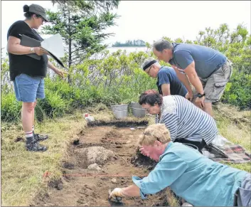  ??  ?? Dr. Katie Cottreau-Robins, left, talks with some volunteers taking part in the public archeology program at the Fort Saint Louis site in Port La Tour. The month-long archeology dig at the site began on July 3.