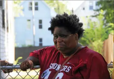  ?? ANNA BISARO — HEARST CONNECTICU­T MEDIA ?? Demethra Telford mourns the death of her son, Tyriek Keyes, who was shot and killed in Newhallvil­leon July 16. Tyriek was 14.