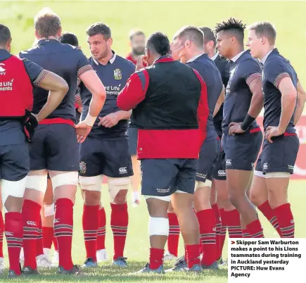  ??  ?? > Skipper Sam Warburton makes a point to his LIons teammates during training in Auckland yesterday PICTURE: Huw Evans Agency