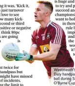  ??  ?? Westmeath’s Killian Daly handpassin­g the ball during Sunday’s O’Byrne Cup clash