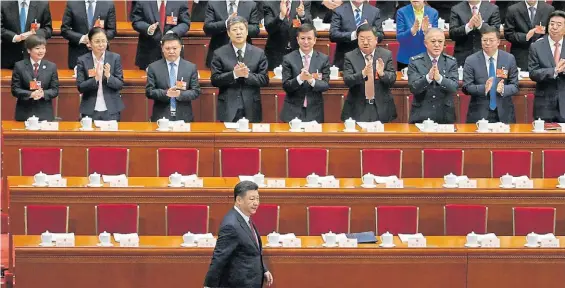  ?? EFE ?? Entrada. El presidente Xi Jinping, ayer, al hacer su ingreso a la Asamblea Nacional (el Parlamento de China), que abrió su 13° sesión plenaria.