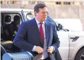  ?? SUSAN WALSH/AP ?? Former Trump campaign chairman Paul Manafort arrives at federal court in Washington in December. New charges were filed Thursday.