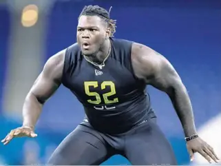  ?? MICHAEL CONROY/AP ?? Isaiah Wilson performed well enough at the NFL scouting combined last spring to be a first-round pick by Tennessee.