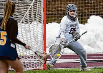 ?? Photos by Jim Franco/times Union ?? Burnt Hills-ballston Lake goalie Isabella Yecies makes a save against Averill Park on Friday. The freshman went 4-for-4 on saves against free position shot attempts.