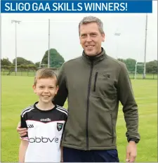  ??  ?? On Saturday, the winners of Sligo GAA’s Coaching and Games skills competitio­ns over the past number of weeks were presented with their Sligo GAA jerseys by Kyle Cawley, Paddy O’Connor and Sinead Ryan, Sligo footballer­s. Pictured is Senan Hopkins from Coolera/Strandhill.