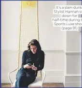  ??  ?? It’s a slam dunk! Stylist Hannah sits down for half-time during the Sports Luxe shoot (page 91)