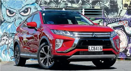  ?? DAVID LINKLATER/STUFF ?? Coupe-style SUVs are so 2017: Eclipse Cross fits in between ASX and Outlander.