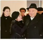  ?? ?? Kim Jong Un hat bei den Feiern seine Tochter Ju Ae (Mitte) prominent in Szene gesetzt.