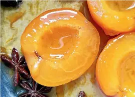  ??  ?? Poached apricots with orange and star anise makes supermarke­t apricots more appetising.