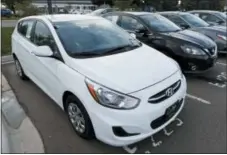  ?? DAVID ZALUBOWSKI — THE ASSOCIATED PRESS ?? A used 2017 Hyundai Accent hatchback sits in a row of other used, late-model sedans at a dealership in Centennial, Colo. Prices of used small cars are on the rise after falling for the past five years.