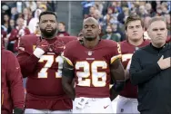  ?? MARK ZALESKI - THE ASSOCIATED PRESS ?? Redskins running back Adrian Peterson stands for the national anthem before a 2018game against the Titans in Nashville, Tenn.