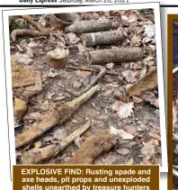  ??  ?? EXPLOSIVE FIND: Rusting spade and axe heads, pit props and unexploded shells unearthed by treasure hunters