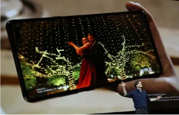  ?? — AFP photo ?? Samsung product marketing manager Drew Blackard announces the new Samsung Galaxy S10 5G during the Samsung Unpacked event on February 20, in San Francisco, California.