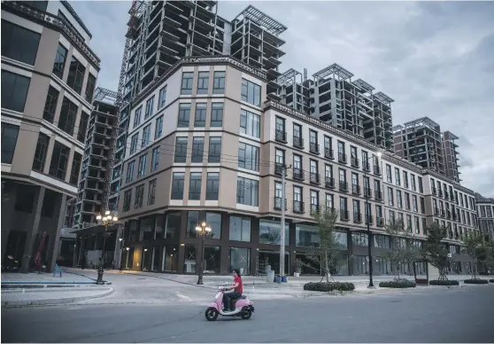  ??  ?? Residentia­l buildings at the One Park developmen­t in the Boeung Kak area of Phnom Penh Bloomberg