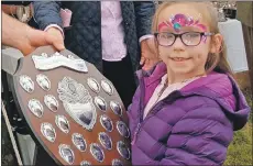  ??  ?? Laura Sharp, 7, from Dalmally wins the children’s shield.