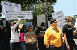  ?? K. CATHEY/NEWS-SENTINEL ?? Demonstrat­ors leave Emerson Park as they march toward Downtown Lodi in support of the Black Lives Matter movement on Sunday.