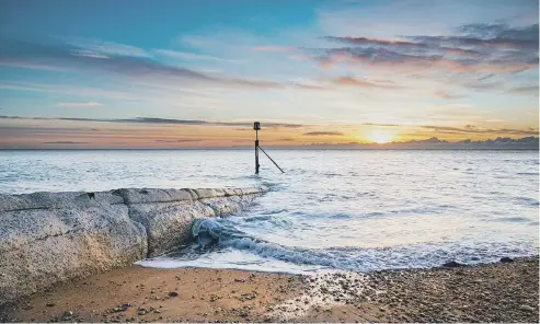  ?? ?? John and Jean from Coastal JJ sent in this snap of a sunrise from East Beach, Selsey, on a bright and frosty morning